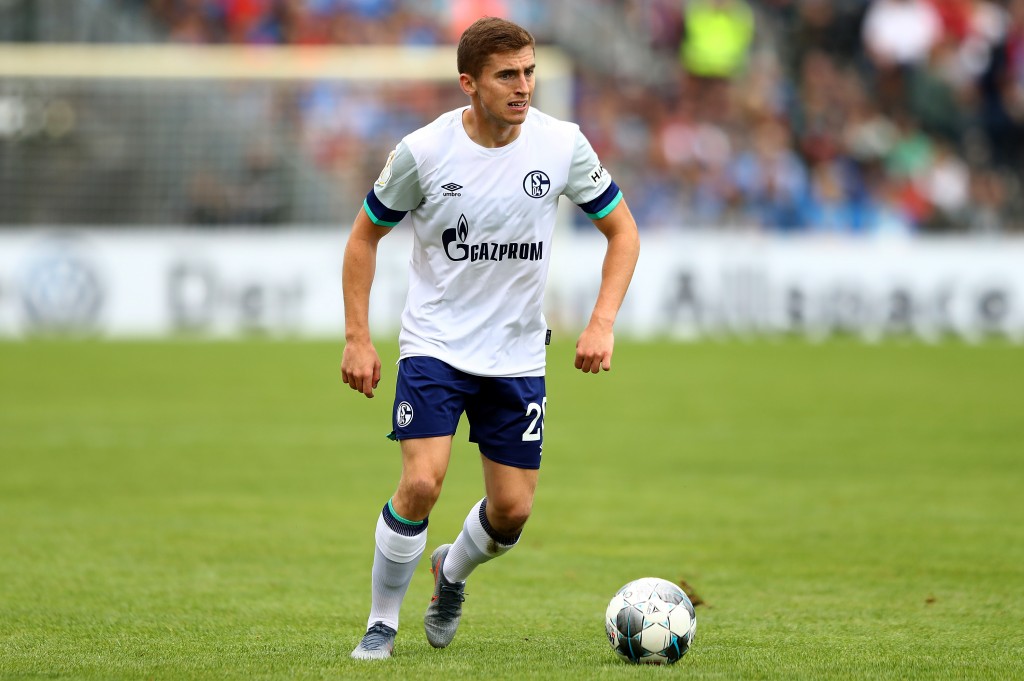 DROCHTERSEN, GERMANY - AUGUST 10: Jonjoe Kenny of Schalke runs with the ball during the DFB Cup first round match between SV Drochtersen Assel and FC Schalke 04 at Kehdinger Stadion on August 10, 2019 in Drochtersen, Germany. (Photo by Martin Rose/Bongarts/Getty Images)