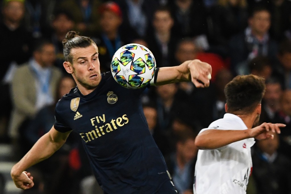 Bale had a goal ruled out for handball (Photo by MARTIN BUREAU/AFP/Getty Images)
