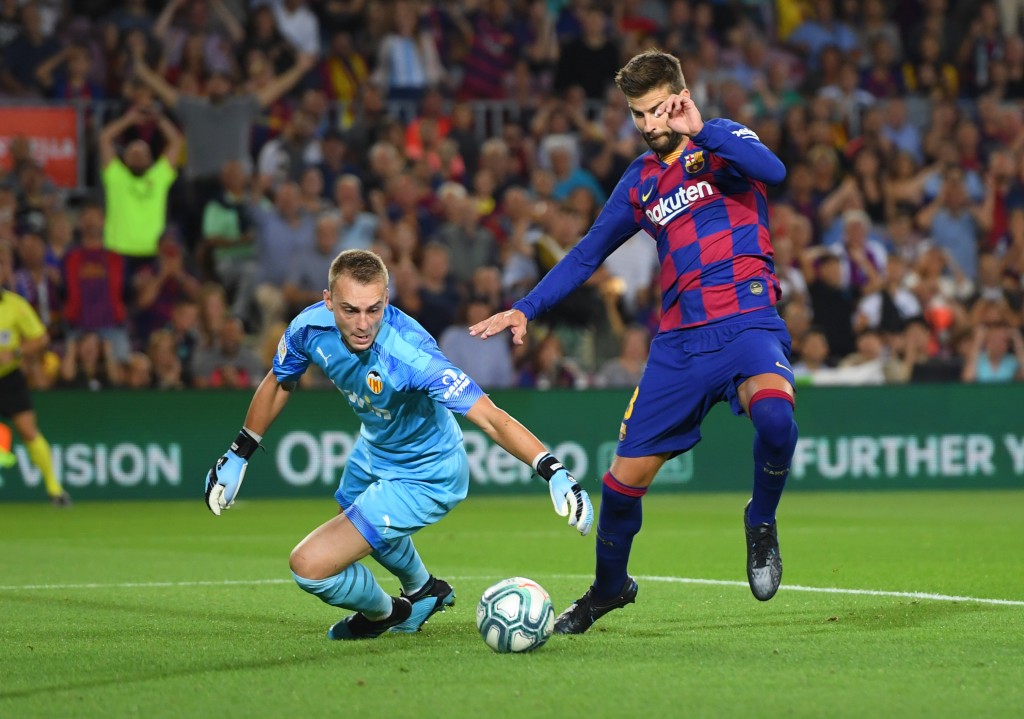 Pique scored Barcelona's third goal (Photo by Alex Caparros/Getty Images)