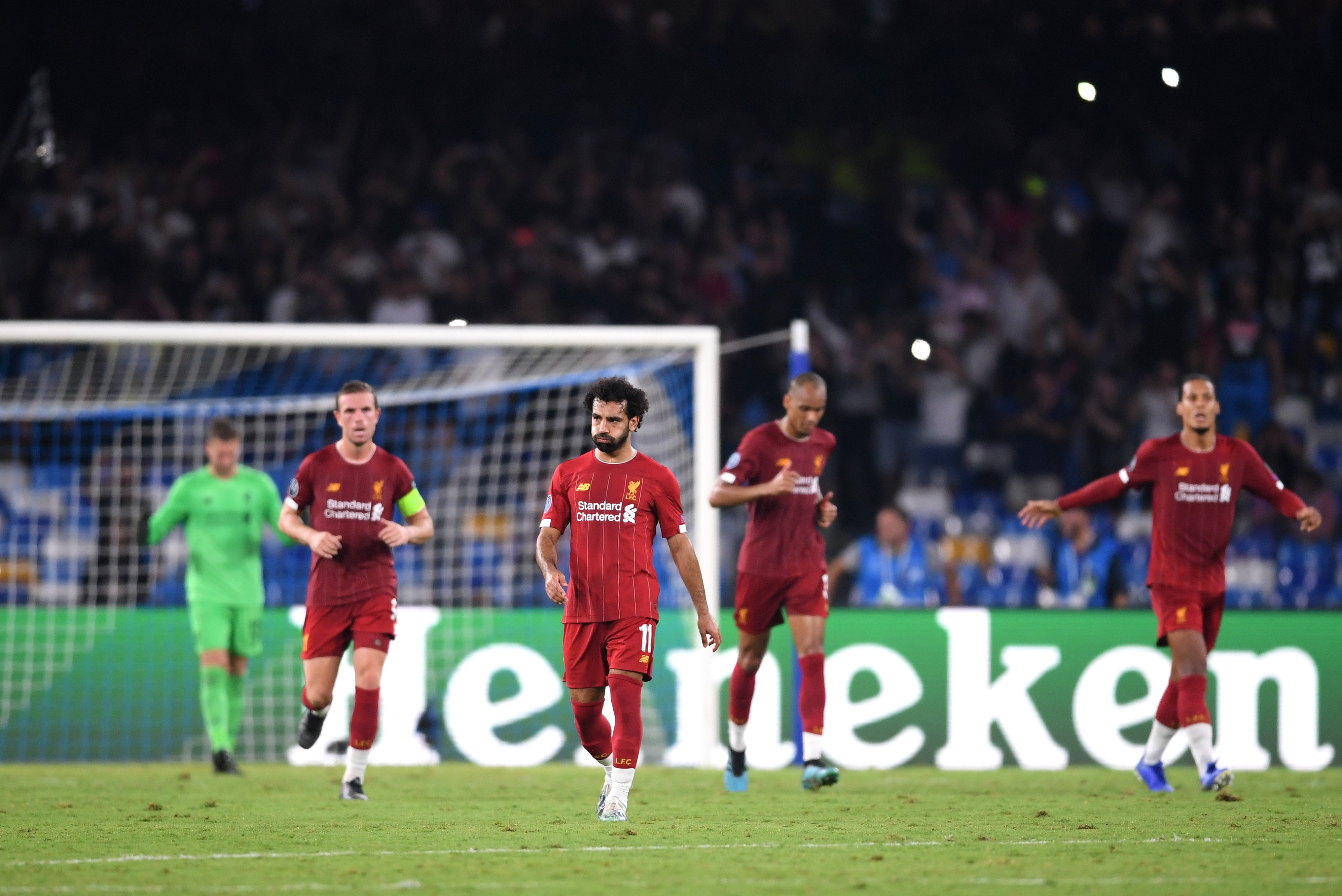 NAPLES, ITALY - SEPTEMBER 17:  Mohamed Salah of Liverpool reacts as Napoli score their first goal during the UEFA Champions League group E match between SSC Napoli and Liverpool FC at Stadio San Paolo on September 17, 2019 in Naples, Italy. (Photo by Laurence Griffiths/Getty Images)