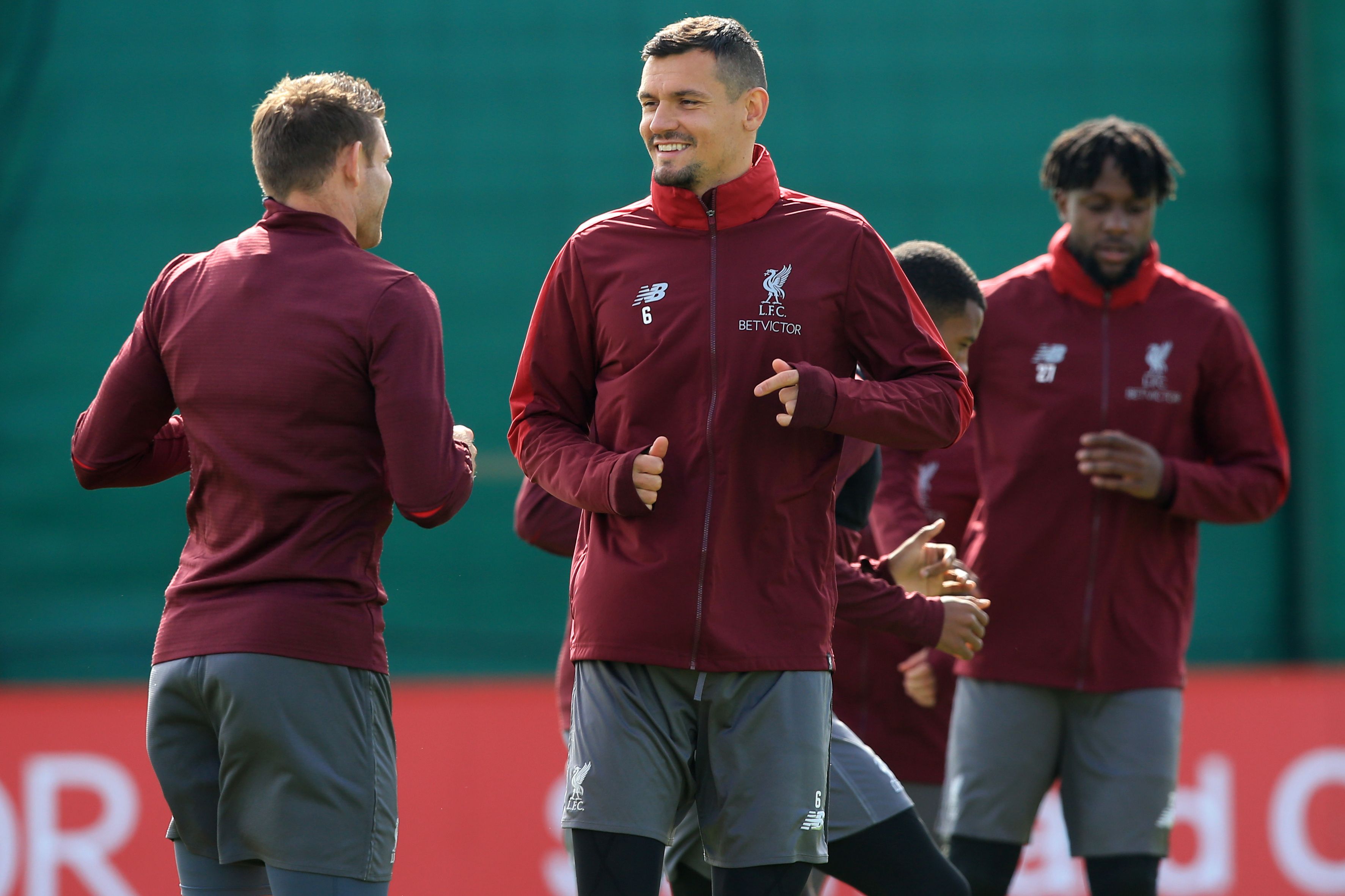 Liverpool's English midfielder James Milner (L), Liverpool's Croatian defender Dejan Lovren (C) and Liverpool's Belgian striker Divock Origi takes part in a team training session at Melwood in Liverpool, north west England on May 6, 2019, on the eve of their UEFA Champions League semi-final second leg football match against Barcelona. (Photo by Lindsey PARNABY / AFP) (Photo credit should read LINDSEY PARNABY/AFP/Getty Images)