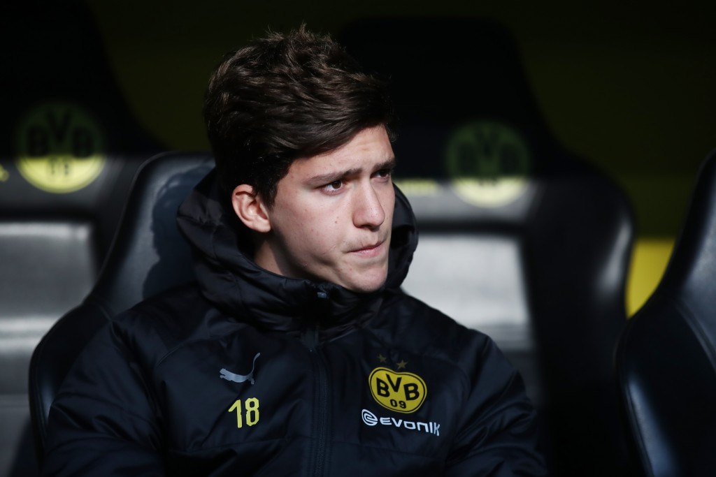 DORTMUND, GERMANY - APRIL 13: Leonardo Balerdi of Dortmund sits on the bench prior to the Bundesliga match between Borussia Dortmund and 1. FSV Mainz 05 at Signal Iduna Park on April 13, 2019 in Dortmund, Germany. (Photo by Alex Grimm/Bongarts/Getty Images)