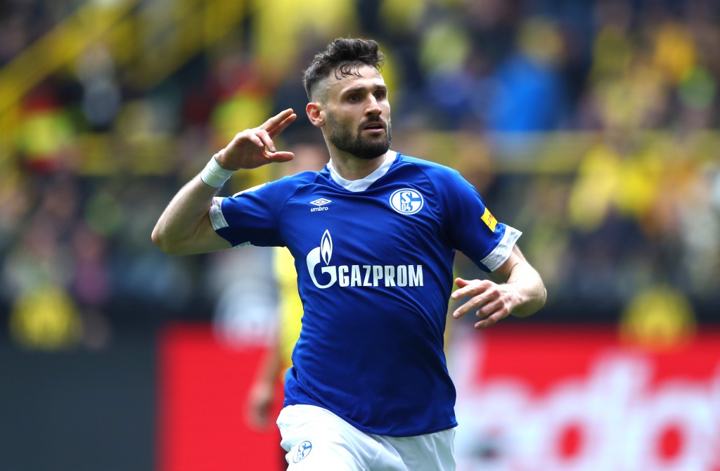 DORTMUND, GERMANY - APRIL 27: Daniel Caligiuri of FC Schalke 04 celebrates after scoring his team's third goal during the Bundesliga match between Borussia Dortmund and FC Schalke 04 at Signal Iduna Park on April 27, 2019 in Dortmund, Germany. (Photo by Martin Rose/Bongarts/Getty Images)