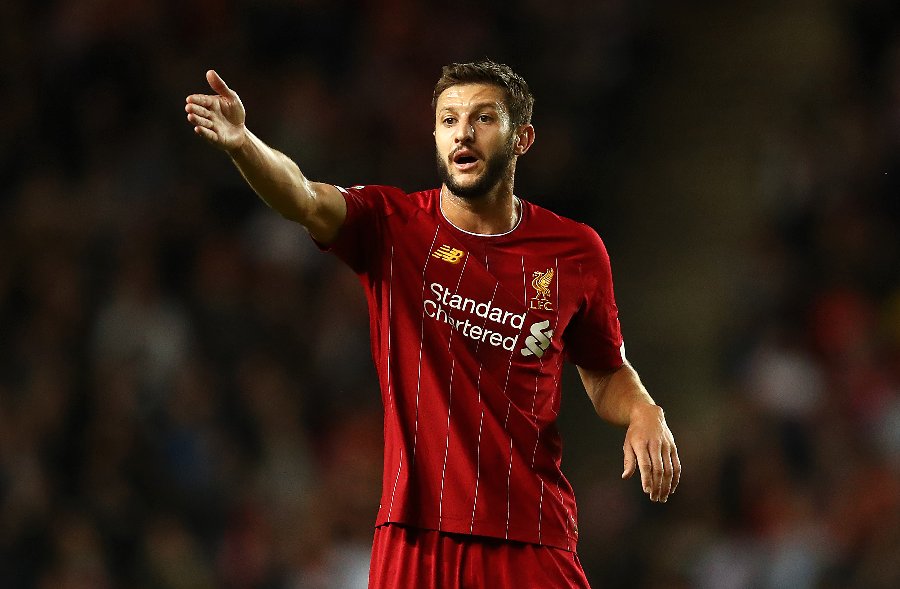 MILTON KEYNES, ENGLAND - SEPTEMBER 25:   Adam Lallana of Liverpool gives instructions during the Carabao Cup Third Round match between MK Dons and Liverpool at Stadium mk on September 25, 2019 in Milton Keynes, England. (Photo by Julian Finney/Getty Images)