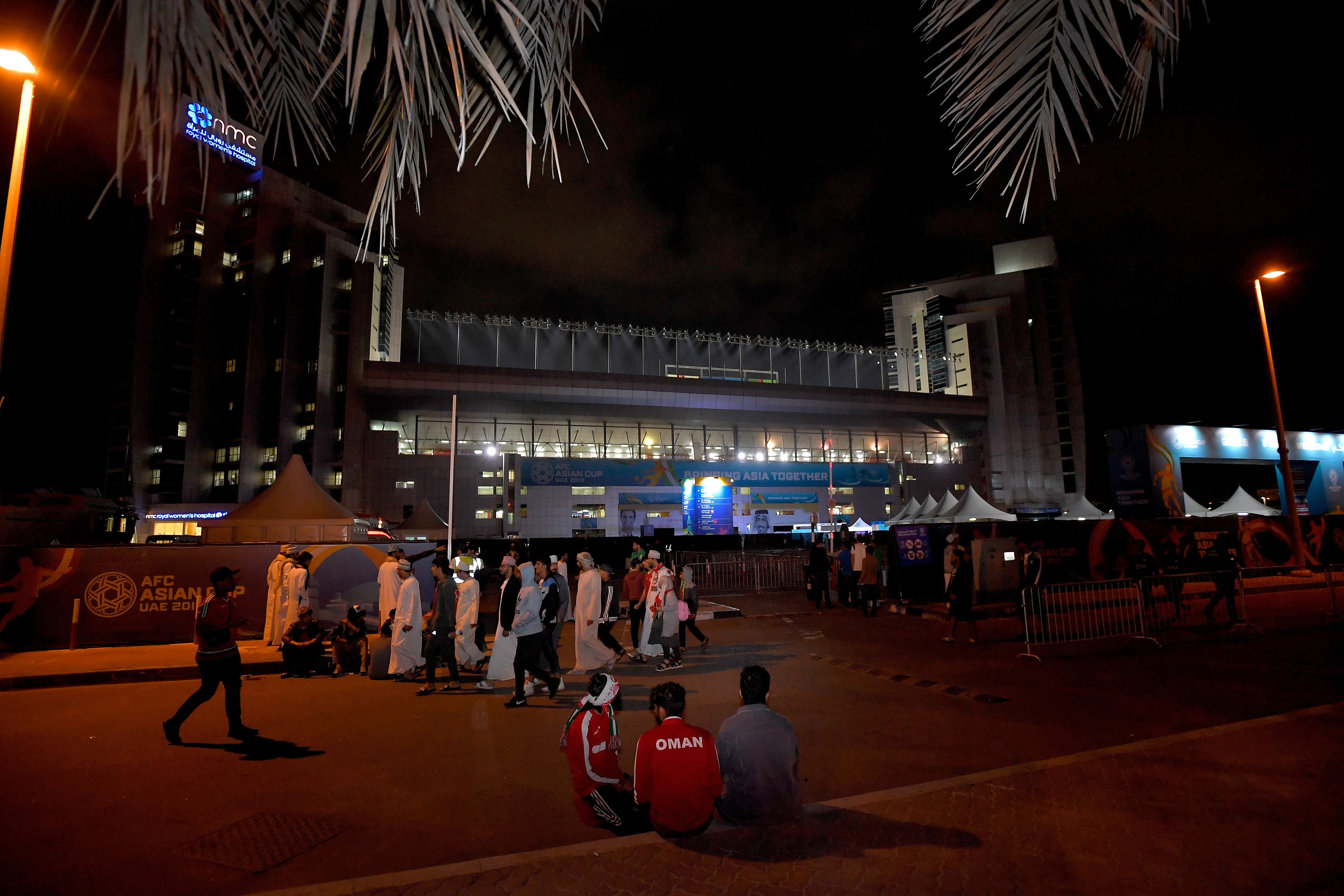 ABU DHABI, UNITED ARAB EMIRATES - JANUARY 20: Fans wait outside the stadium ahead of the AFC Asian Cup round of 16 match between Iran and Oman at Mohammed Bin Zayed Stadium on January 20, 2019 in Abu Dhabi, United Arab Emirates. (Photo by Koki Nagahama/Getty Images)