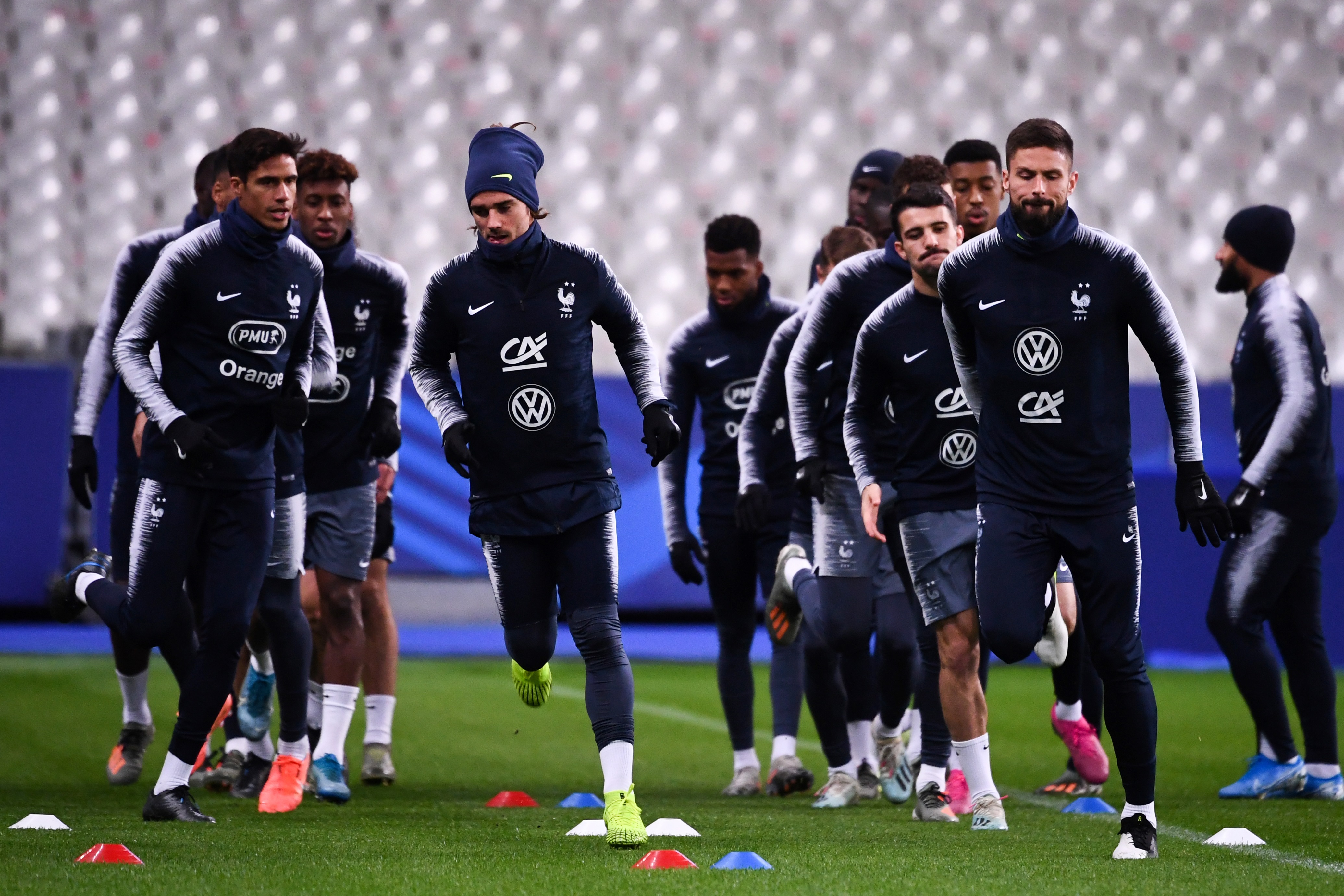 France's forward Antoine Griezmann (L) and France's forward Olivier Giroud (R) take part in a training session of France's national football team at the Stade de France, in Saint-Denis, on the outskirts of Paris, on November 13, 2019, on the eve of the Euro 2020 football qualification match between France and Moldova. (Photo by FRANCK FIFE / AFP) (Photo by FRANCK FIFE/AFP via Getty Images)