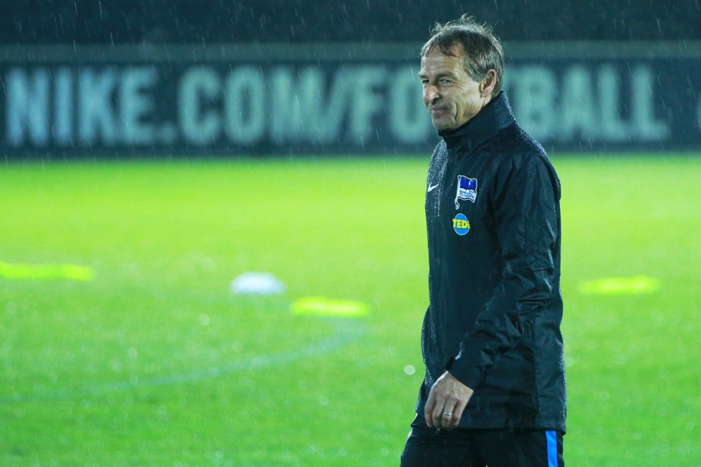 BERLIN, GERMANY - NOVEMBER 27: Juergen Klinsmann walks on the lawn during a training session on November 27, 2019 in Berlin, Germany. (Photo by Christian Marquardt/Bongarts/Getty Images)