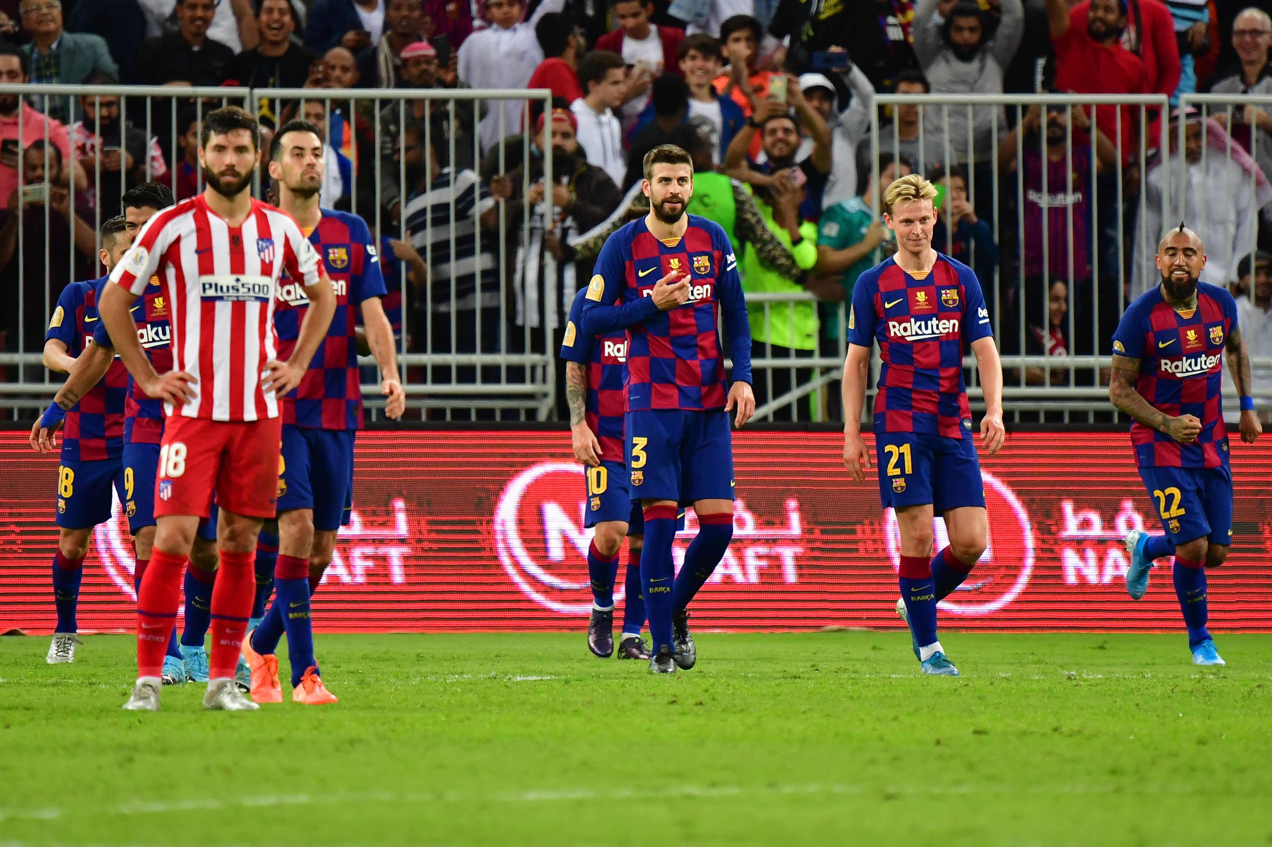 Barcelona's players celebrate their goal, which was disallowed for offside, during the Spanish Super Cup semi final between Barcelona and Atletico Madrid on January 9, 2020, at the King Abdullah Sport City in the Saudi Arabian port city of Jeddah. - The winner will face Real Madrid in the final on January 12. (Photo by Giuseppe CACACE / AFP) (Photo by GIUSEPPE CACACE/AFP via Getty Images)