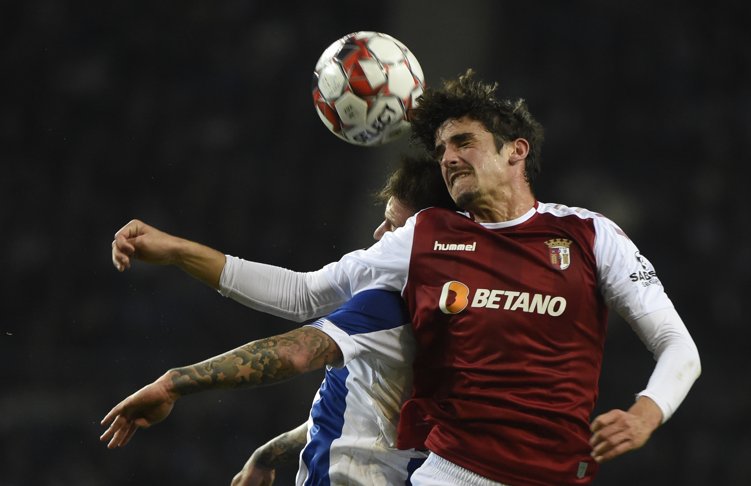 FC Porto's Brazilian midfielder Otavinho (L) vies with Sporting Braga's Portuguese forward Trincao during the Portuguese league football match between FC Porto and SC Braga at the Dragao stadium in Porto on January 17, 2020. (Photo by MIGUEL RIOPA / AFP) (Photo by MIGUEL RIOPA/AFP via Getty Images)