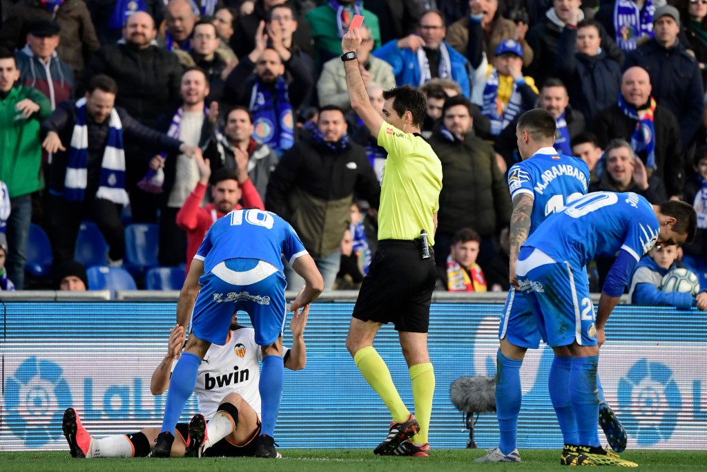 Alessandro Florenzi (in white) is suspended after being sent off against Getafe last week. (Photo by Javier Soriano/AFP via Getty Images)