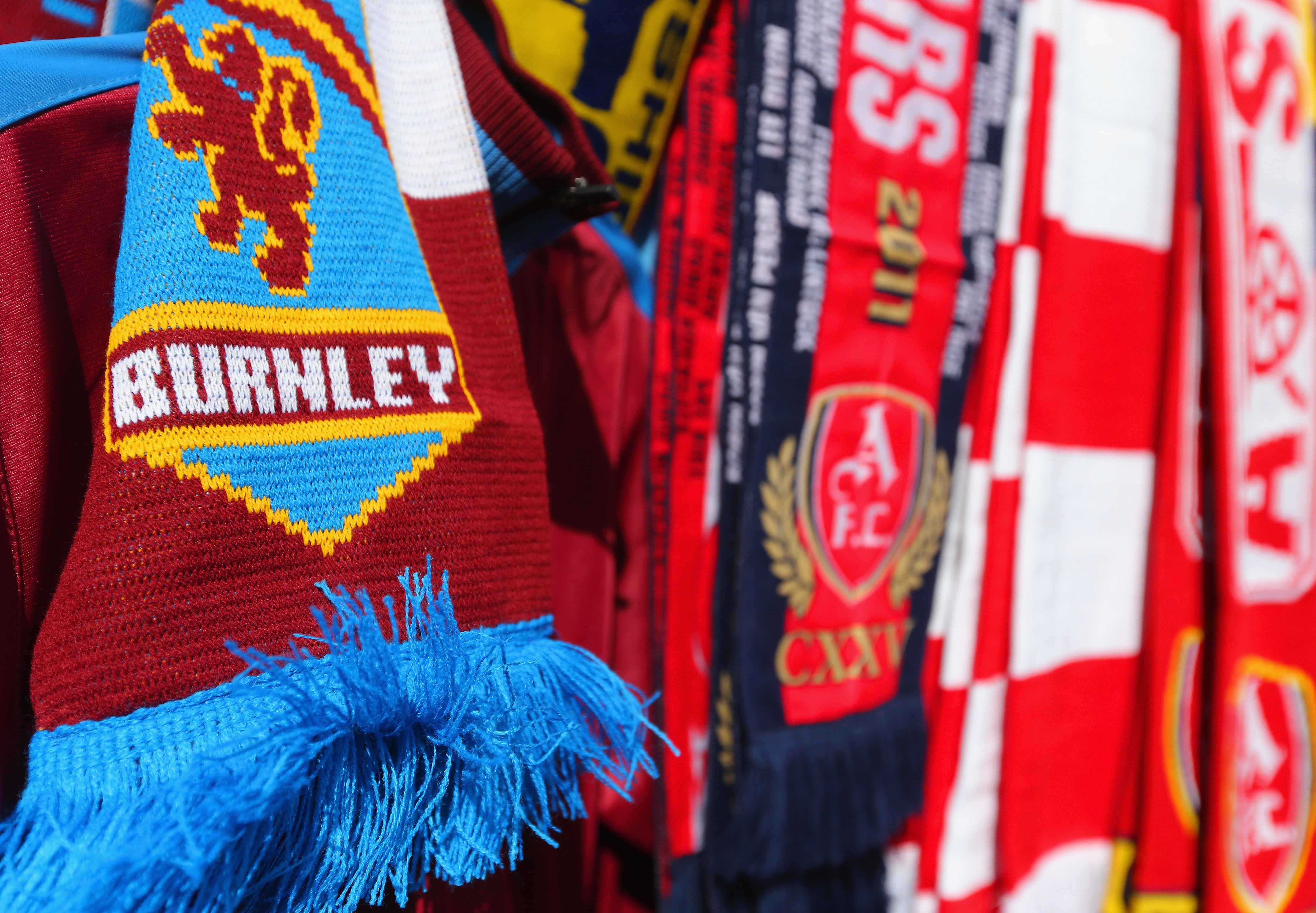 BURNLEY, ENGLAND - APRIL 11: Scarves on sale before the Barclays Premier League match between Burnley and Arsenal at Turf Moor on April 11, 2015 in Burnley, England. (Photo by Dave Thompson/Getty Images)